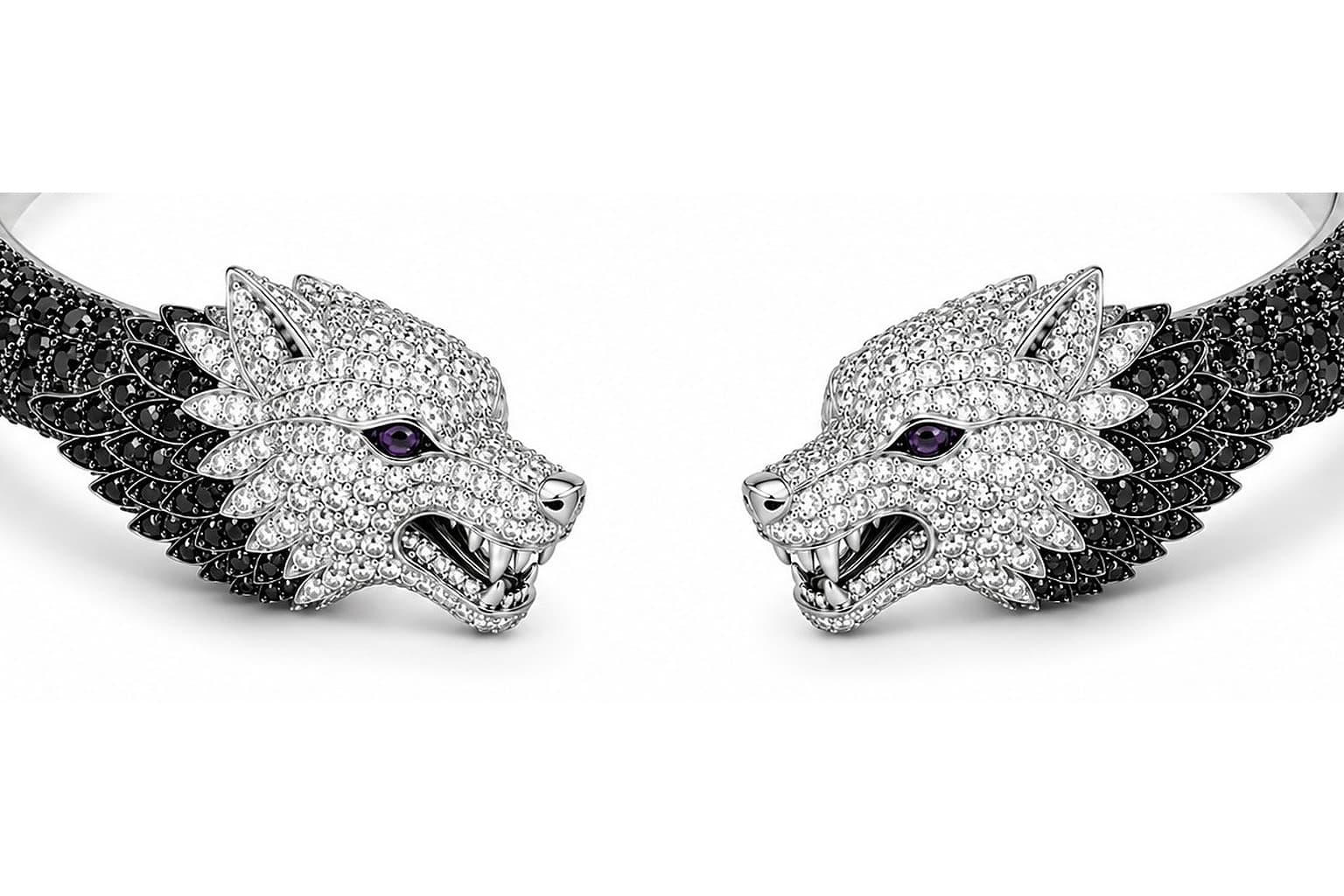 Leader of the Pack Bracelet, the two wolf-head terminals and the opening.
