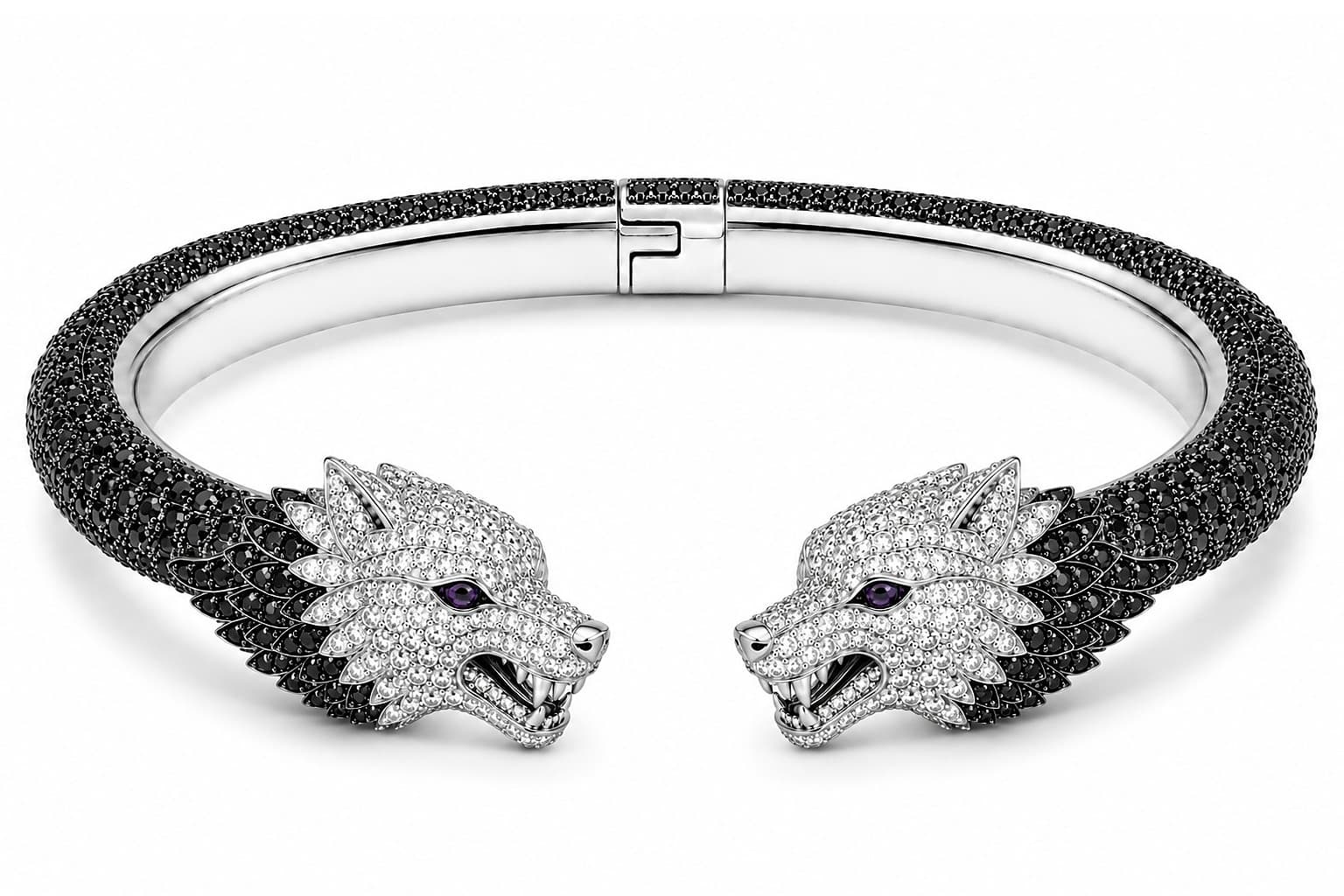 Leader of the Pack, an open cuff in 18K white gold with wolf-head terminals, white diamonds, black diamonds, and sapphire eyes, photographed on seamless white.